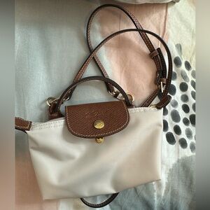 SOLD OUT LE PLIAGE ORIGINAL POUCH WITH HANDLE
Paper - Recycled Canvas